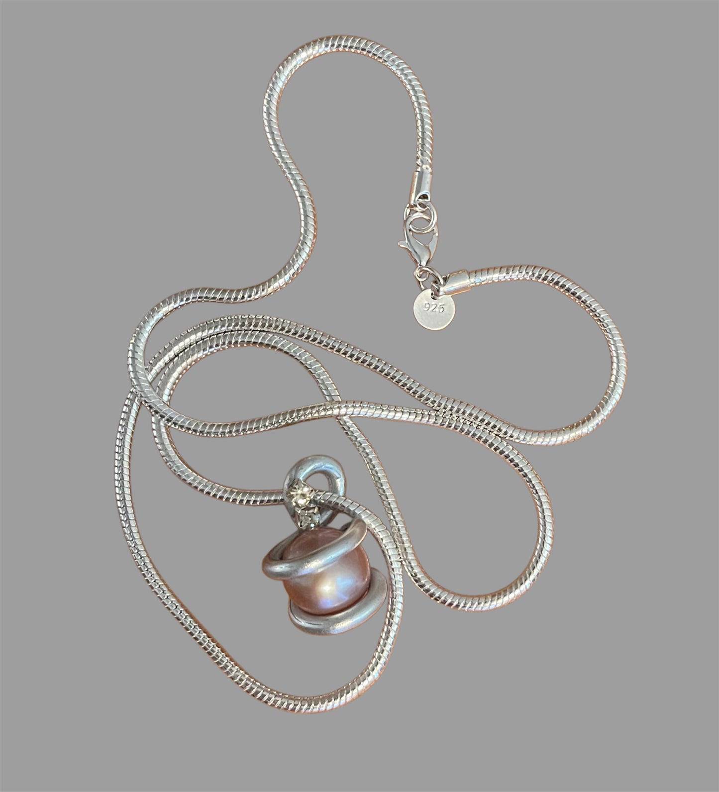 Edison Pearl set in handmade pendant on a 925 Sterling Silver Snake Chain.