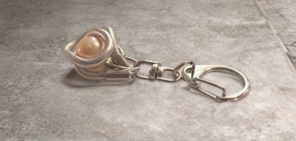 Handcrafted Edison Pearl Keychain with Emerald Crystal Accents