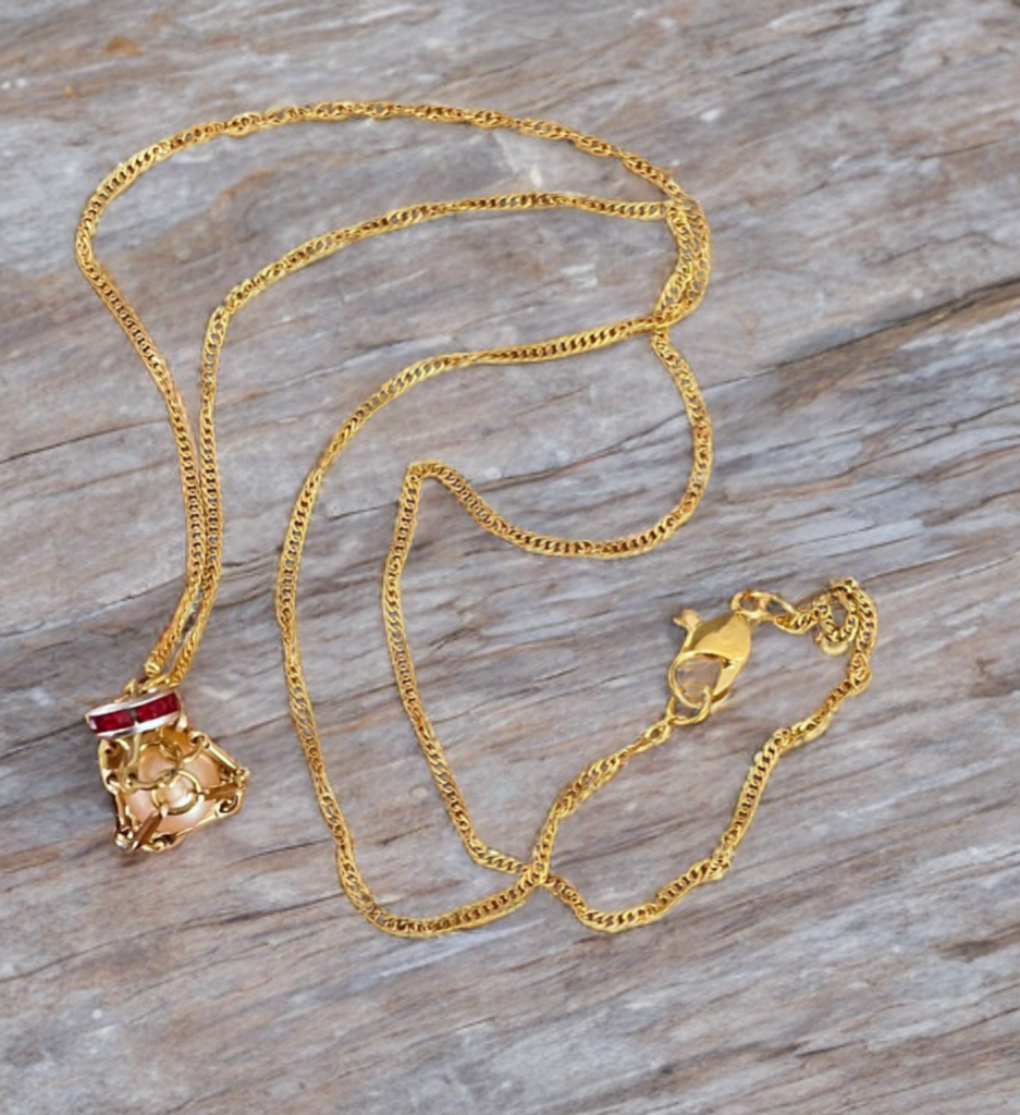 Petite Edison Pearl Necklace in Gold Toned Cage with Ruby Crystal Accent