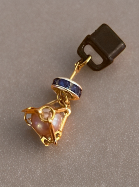 Petite Edison Pearl USB-C Port Charm enclosed in gold toned bar link cage