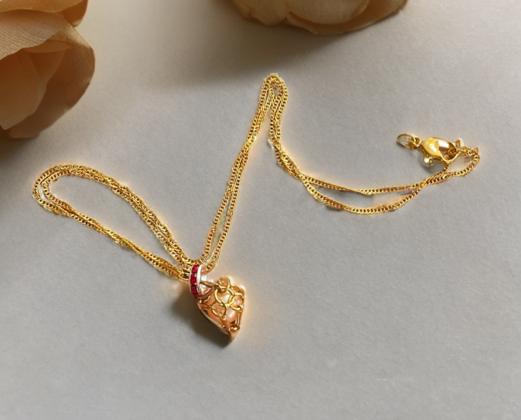 Petite Edison Pearl Necklace in Gold Toned Cage with Ruby Crystal Accent