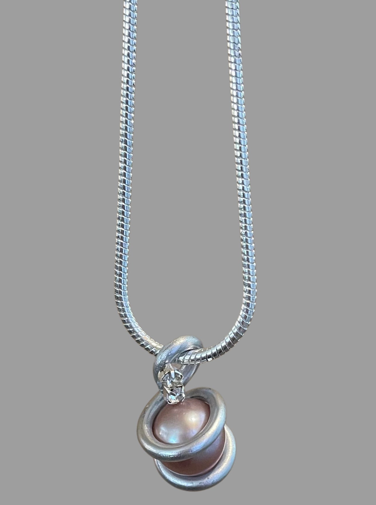 Edison Pearl set in handmade pendant on a 925 Sterling Silver Snake Chain.